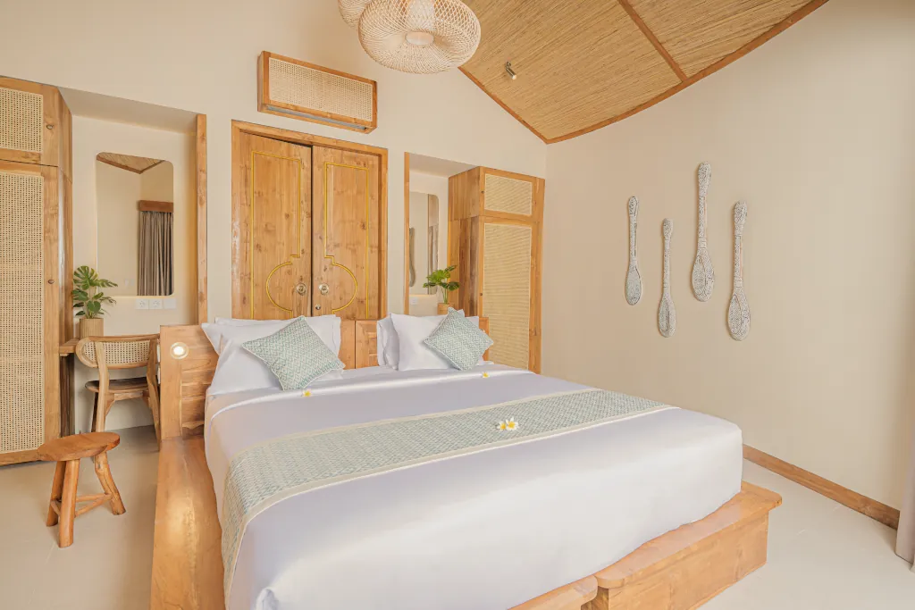 Uluwatu private bungalow room with a double bed and Island style charm.