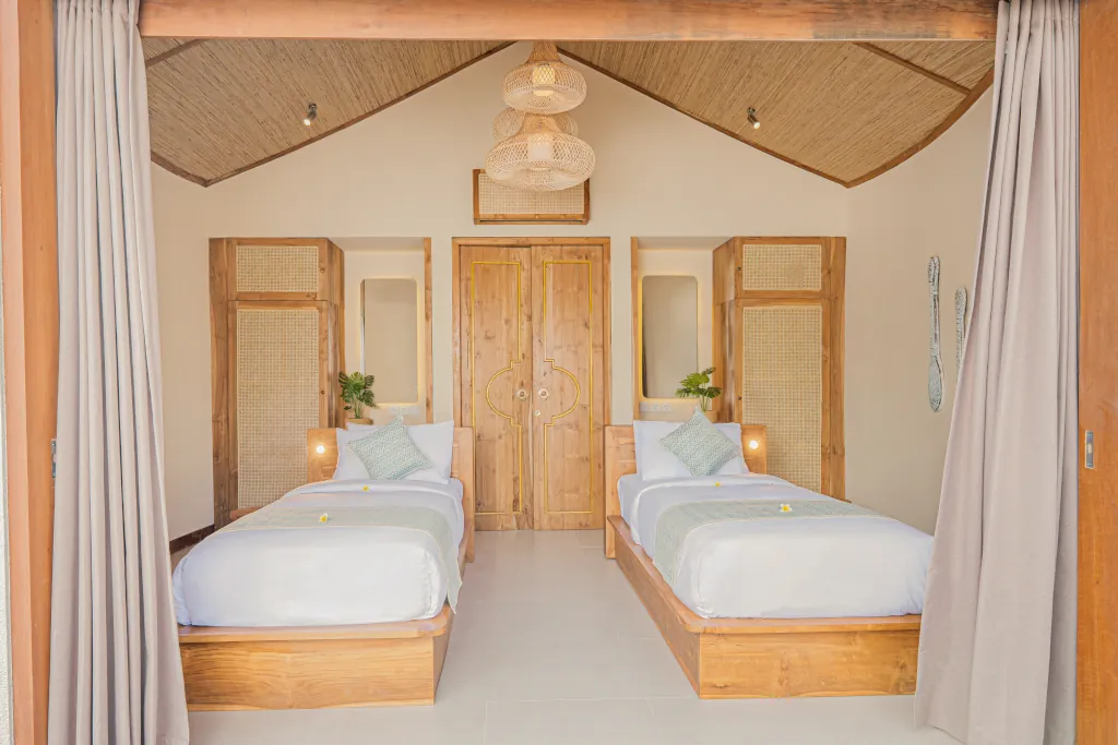 Uluwatu dorm room with a bunk bed configuration.