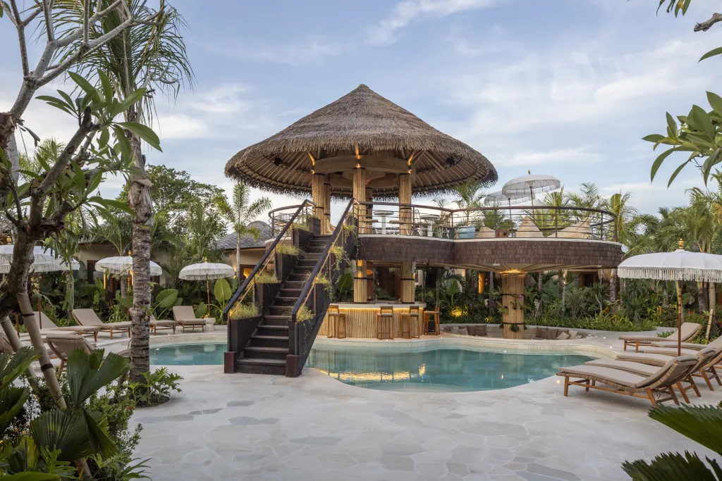 The main pool and hangout area at Kima Surf Uluwatu