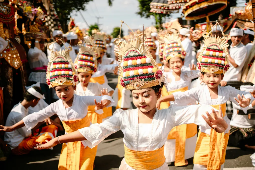 children in traditional balinese attire dancing
