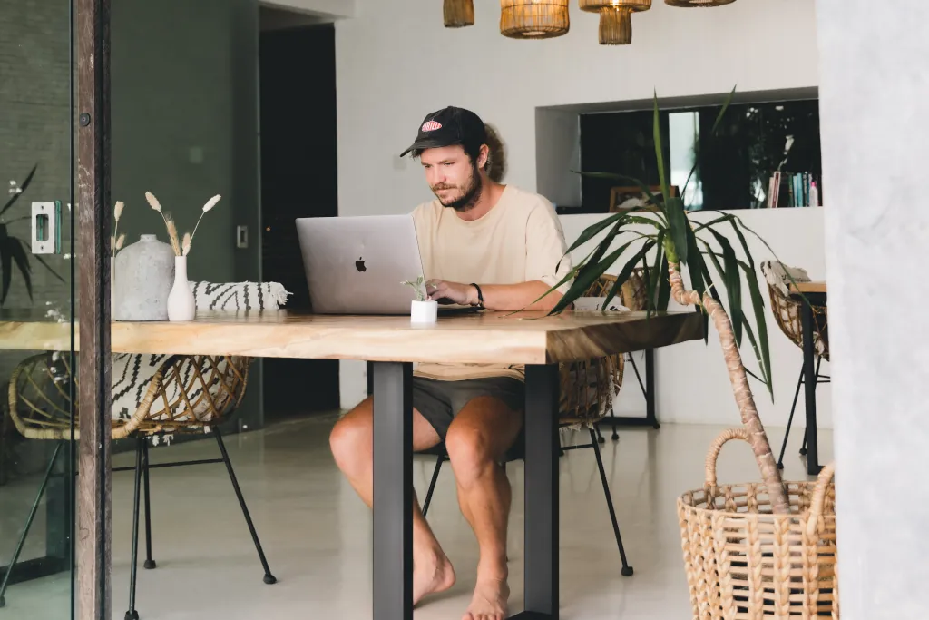 a man on his laptop in the coworking space