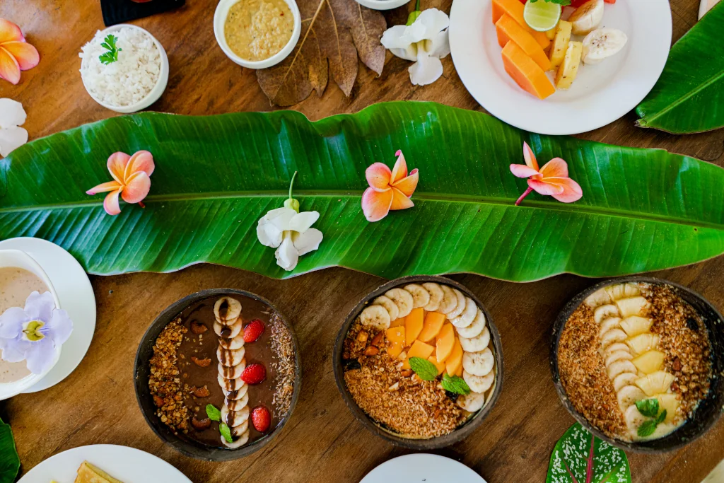Breakfast smoothie bowls with banana leaves