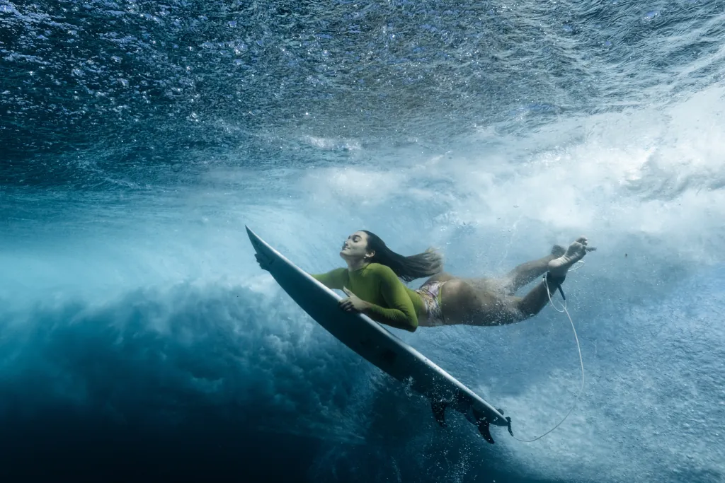 Giada duck diving a wave, taken from underwater POV